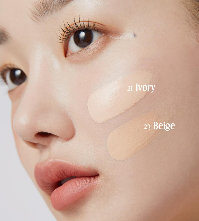 A compact cushion foundation with a sponge applicator, open with a pink lid and beige foundation visible, labeled medicube.