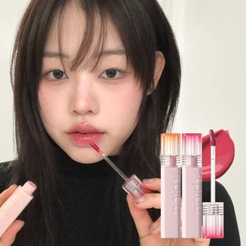 Woman applying A'pieu Juicy Pang Jelly Tint with three lip gloss products displayed next to her.
