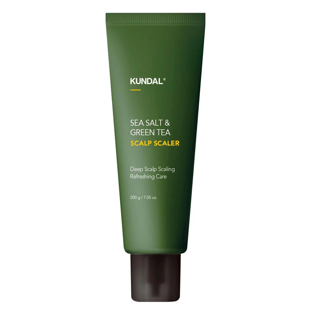 A dark green squeeze tube of KUNDAL Sea Salt & Green Tea Scalp Scaler on a plain white background.