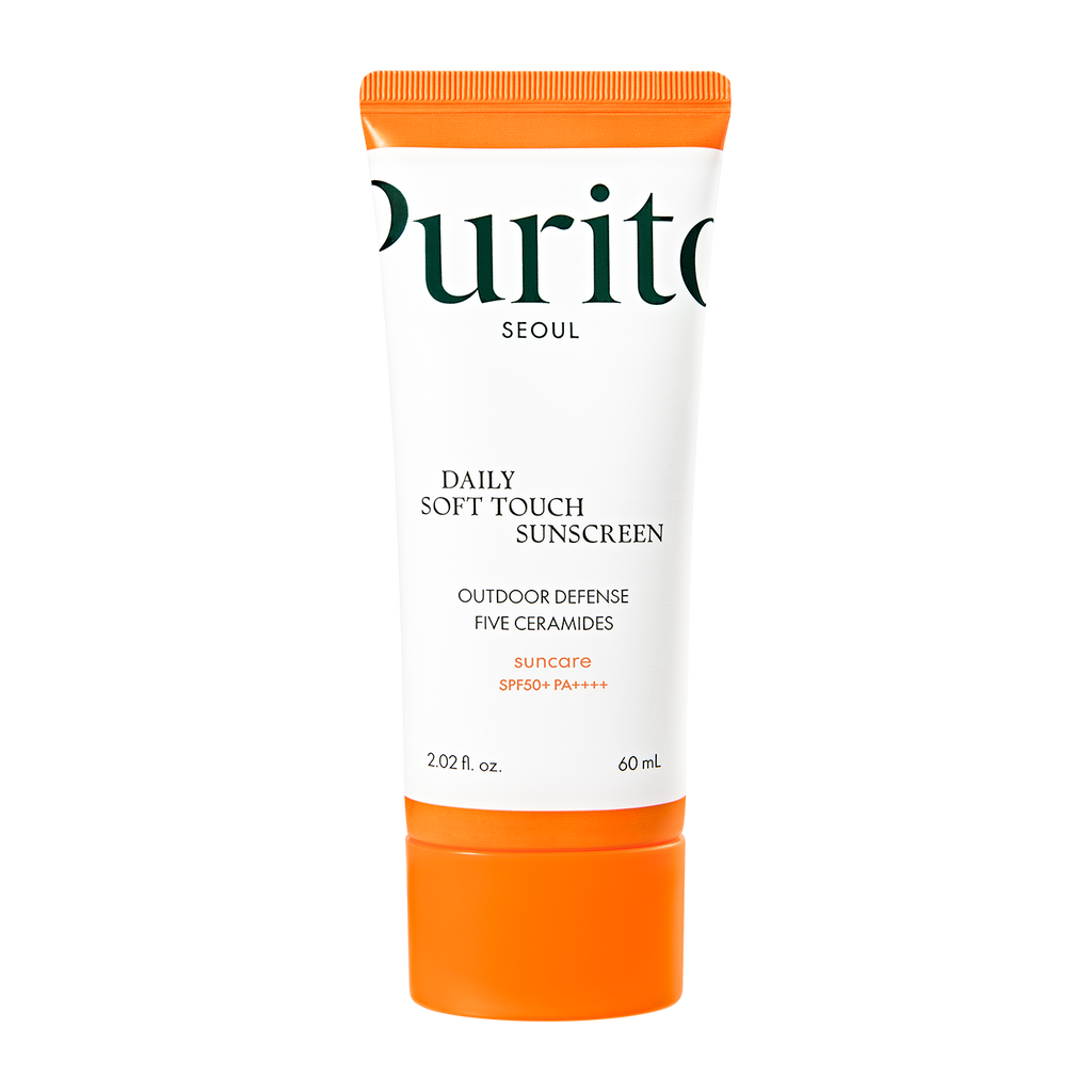 A tube of PURITO SEOUL Daily Soft Touch Sunscreen SPF50+ PA++++, with white and orange packaging.