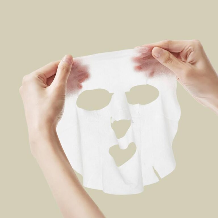Pyunkang Yul Calming Mask held between two hands against a beige background