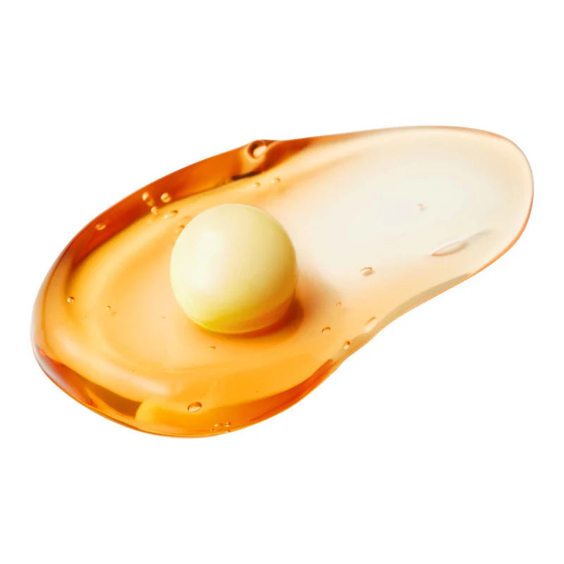 medicube Kojic Acid Turmeric Vita Capsule Cream on a transparent orange platform with a white background